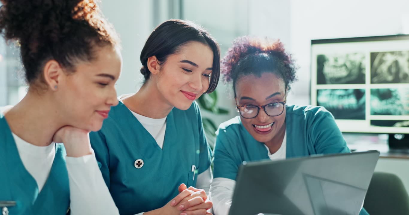 Nursing students supporting each other during a study session